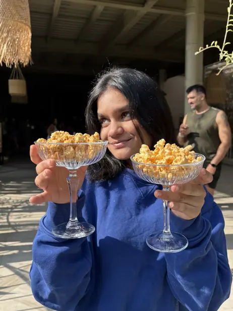 Two coupe glasses filled with Poptein popcorn